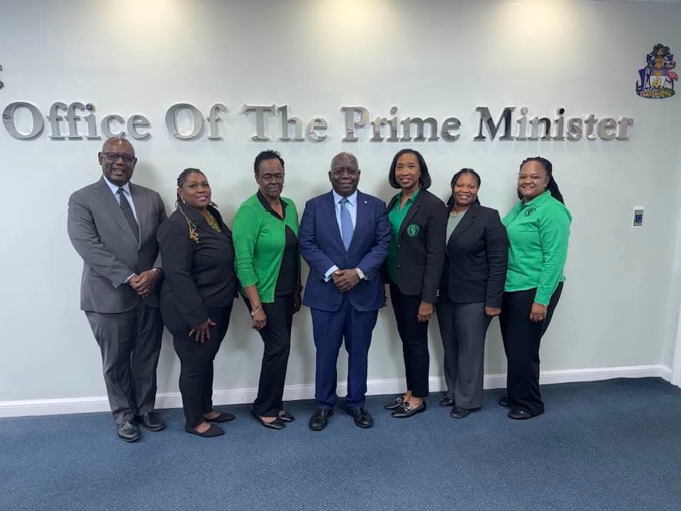 President Sandra Major and team negotiating with Prime Minister Philip Davis to improve salaries benefits and working conditions for teachers across The Bahamas .